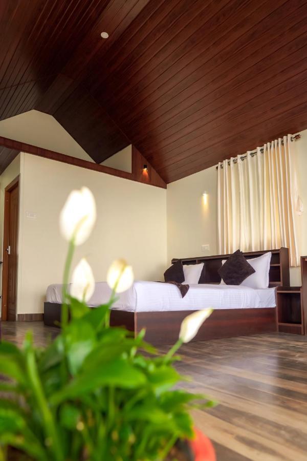 Forest County Hotel Мунар Екстериор снимка