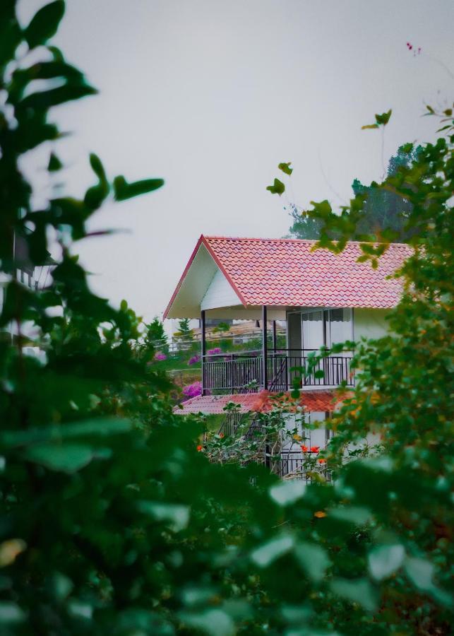Forest County Hotel Мунар Екстериор снимка