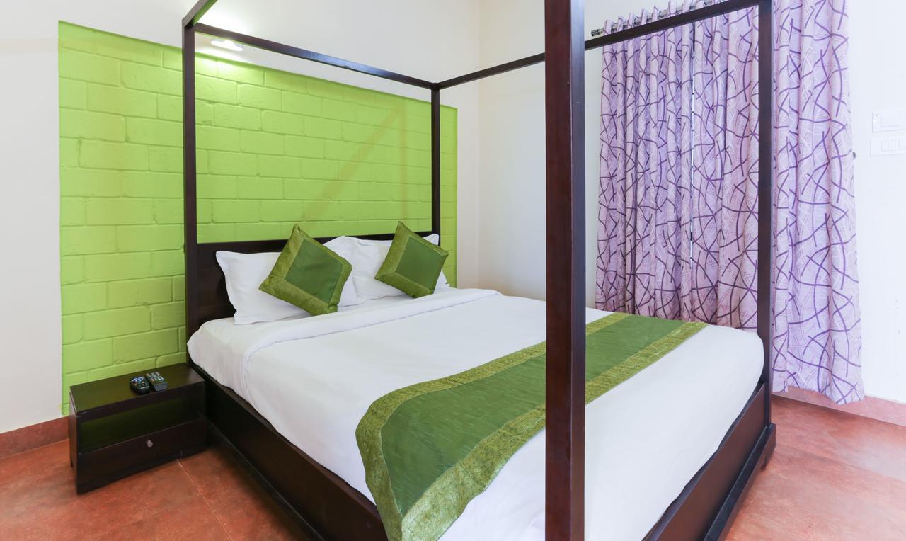 Forest County Hotel Мунар Екстериор снимка